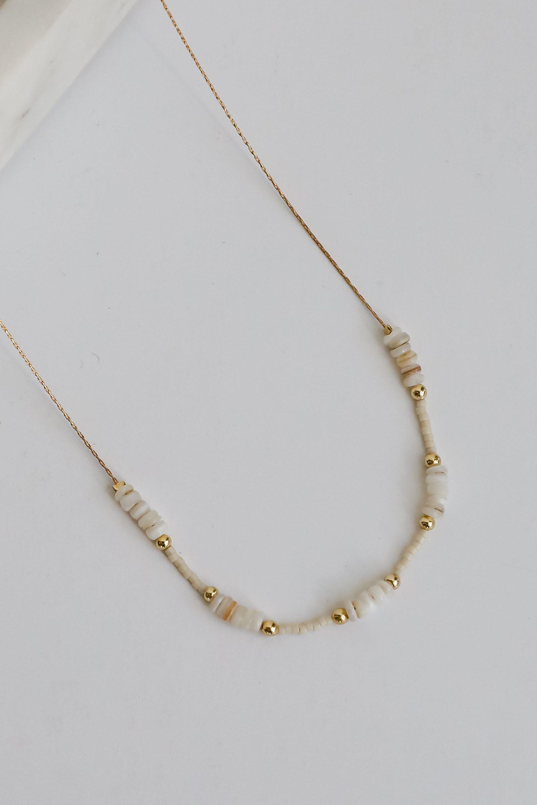 shopdressup_gold_beaded_necklace-2_42c88f6b-ea80-4386-8d5d-207a81545788.jpg