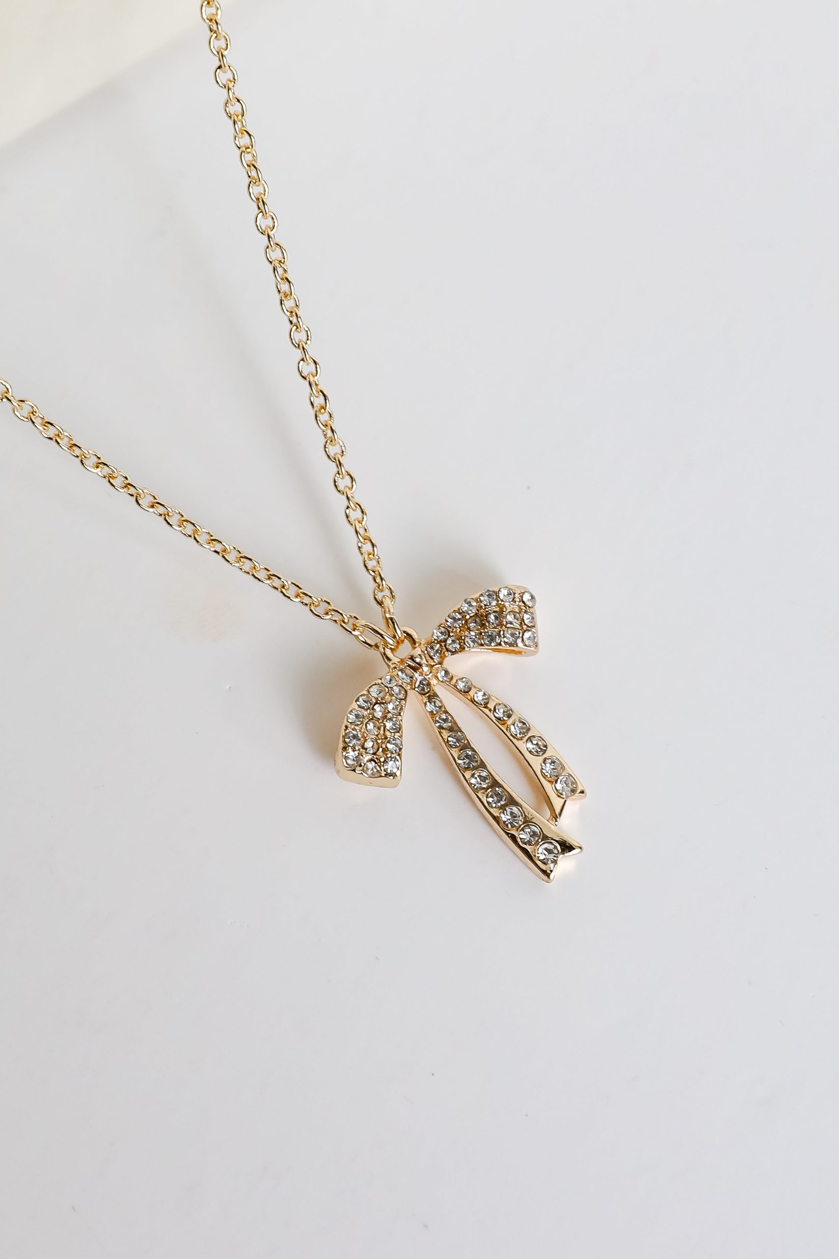 shopdressup_gold_bow_rhinestone_necklace-3.jpg