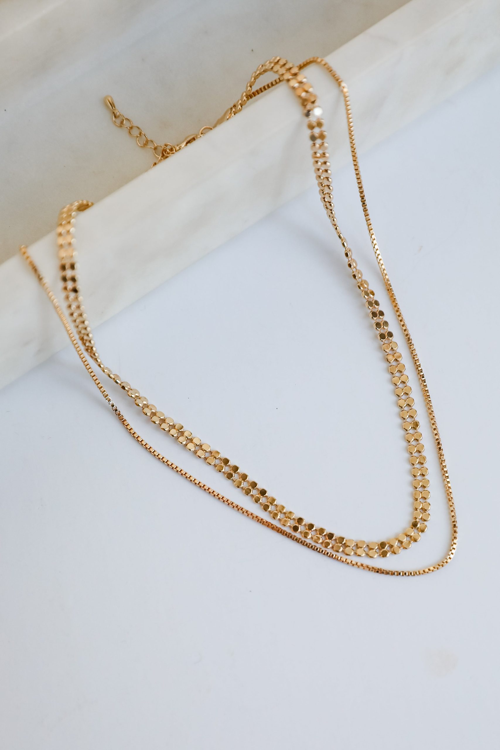 shopdressup_gold_layered_chain_necklace-5_cc65af24-5a64-4019-9678-e54fe6c959e4.jpg