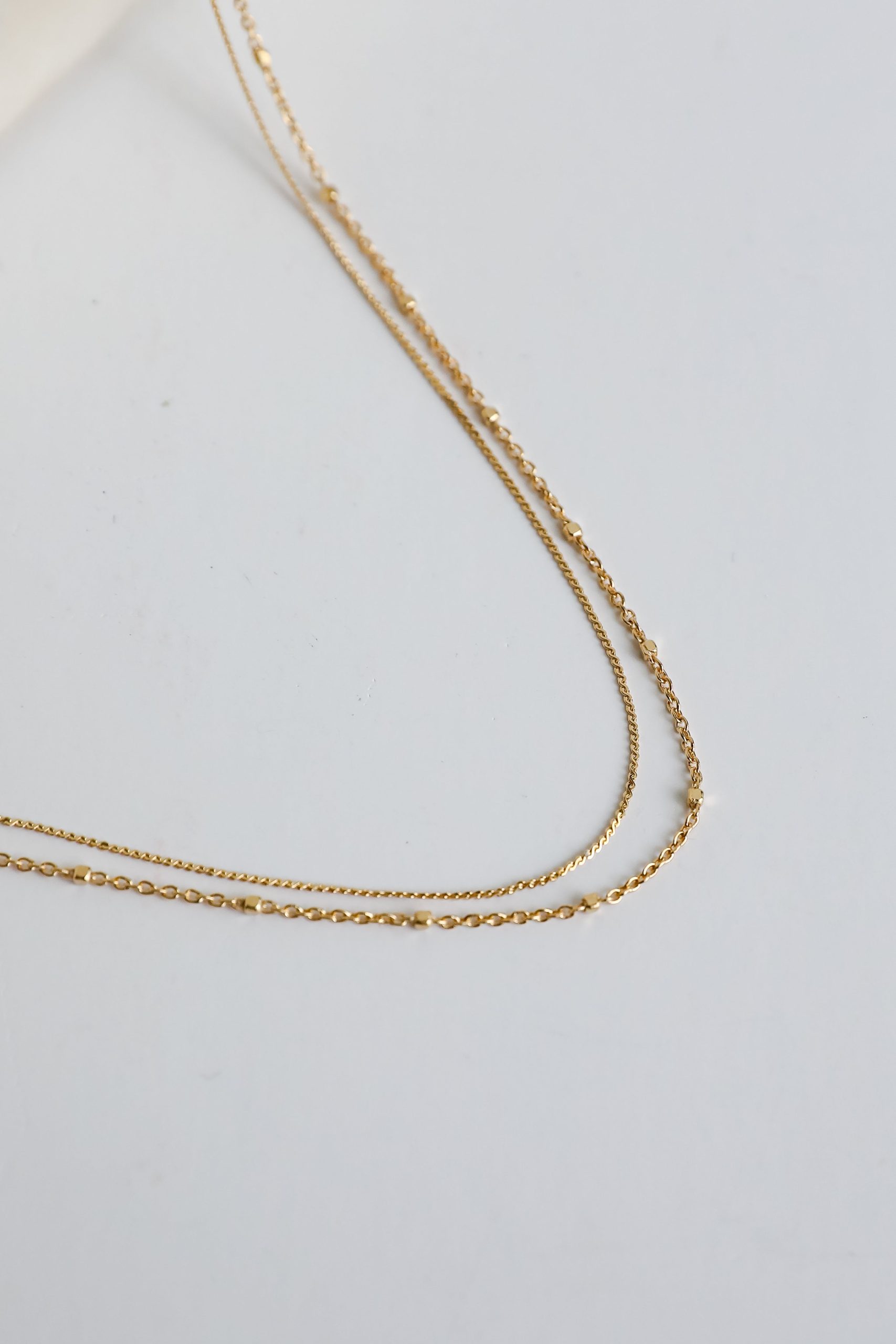 shopdressup_gold_layered_chain_necklace-9_b3479168-d578-4b22-bc00-5c50e29afd62.jpg