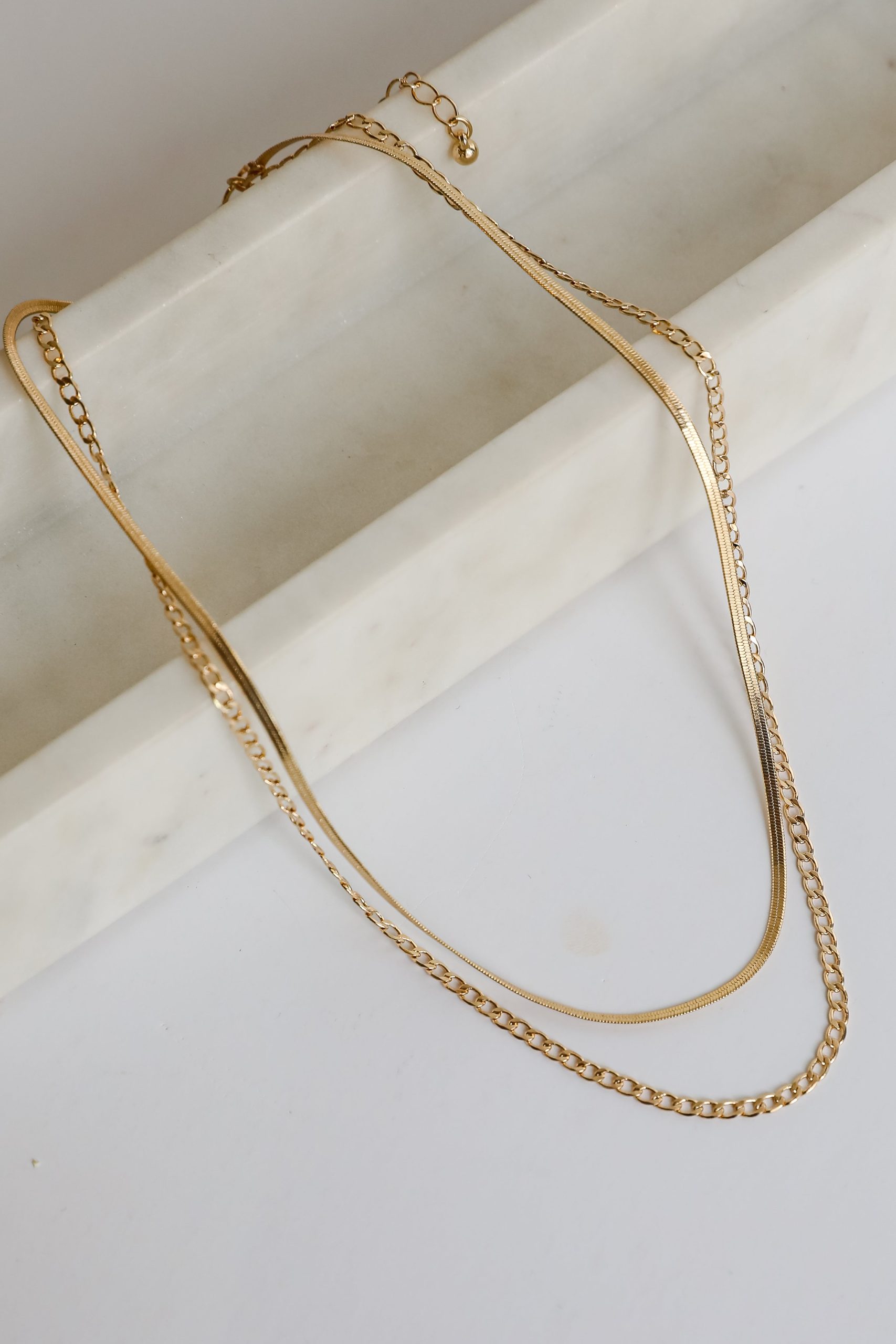 shopdressup_gold_layered_chain_necklace_957e6c91-cb3f-4259-99b7-1b0c844c97e7.jpg