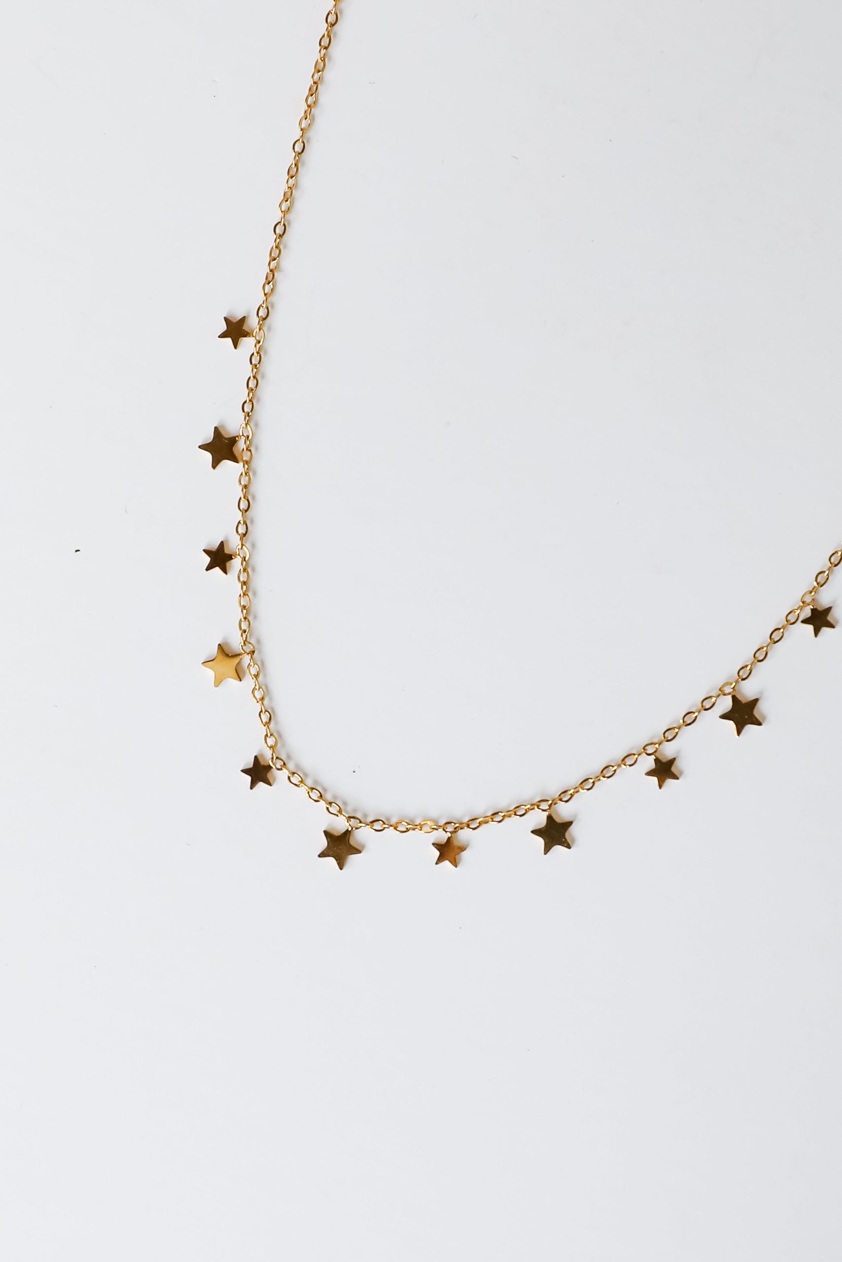 shopdressup_gold_star_charm_necklace-4.jpg